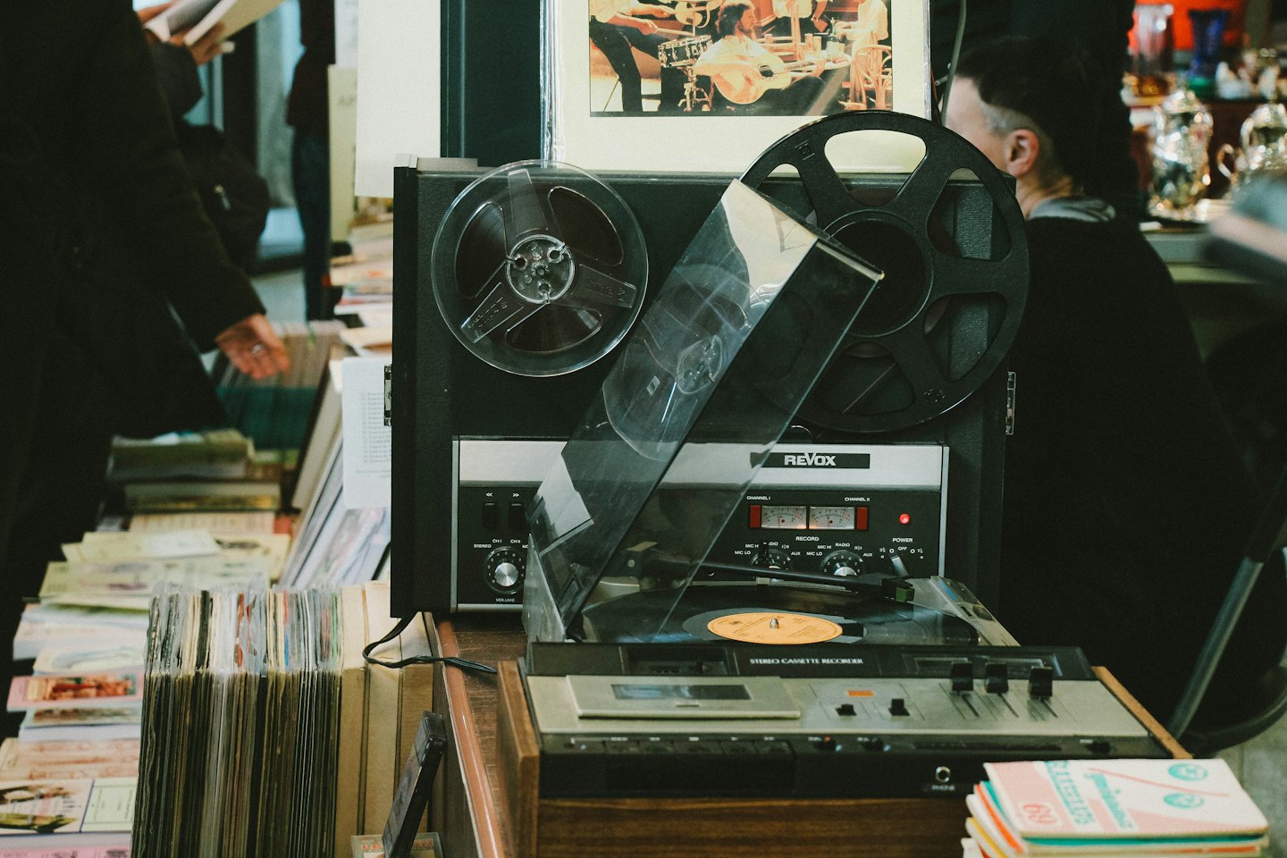 Vintage audio equipment displayed on a wooden surface.